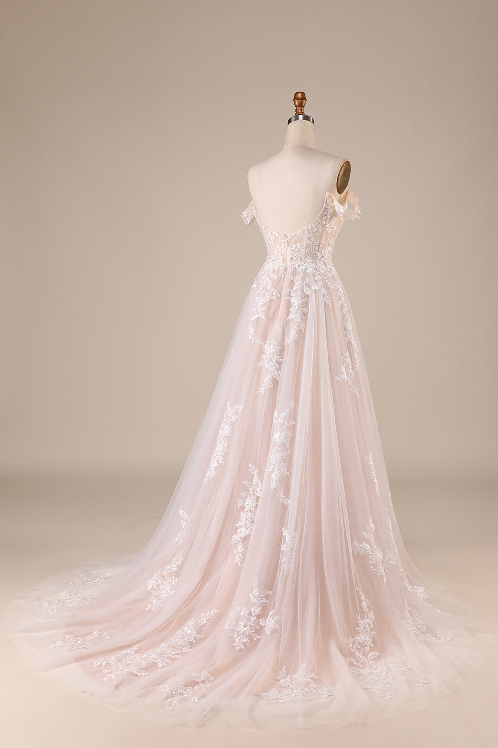 Robe de mariée bustier en tulle ivoire détachable épaules dénudées